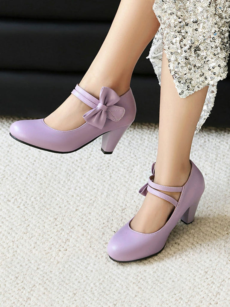 Scarpe con tacco alto in pelle con cinturino a fiocco