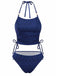 Front view of the navy blue glitter tankini set showcasing the adjustable halter straps and ruched bodice.