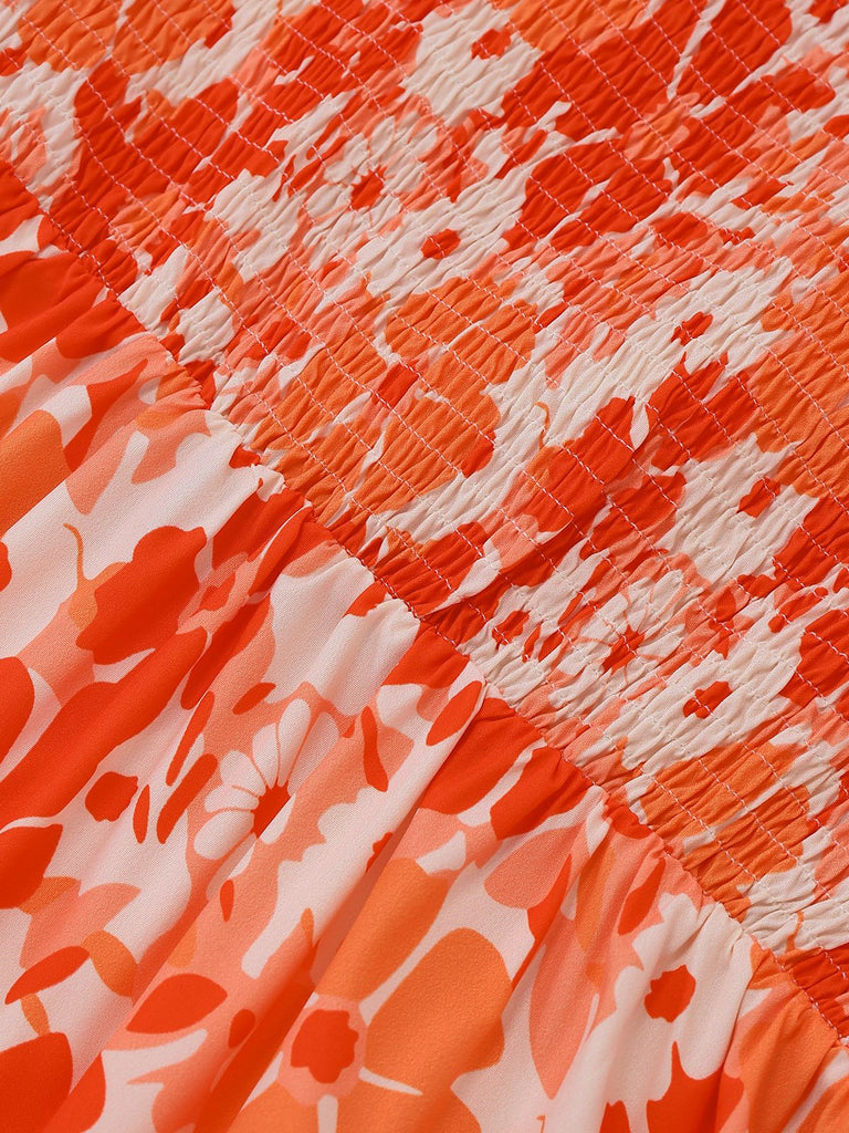 Close-up of orange and white floral fabric texture