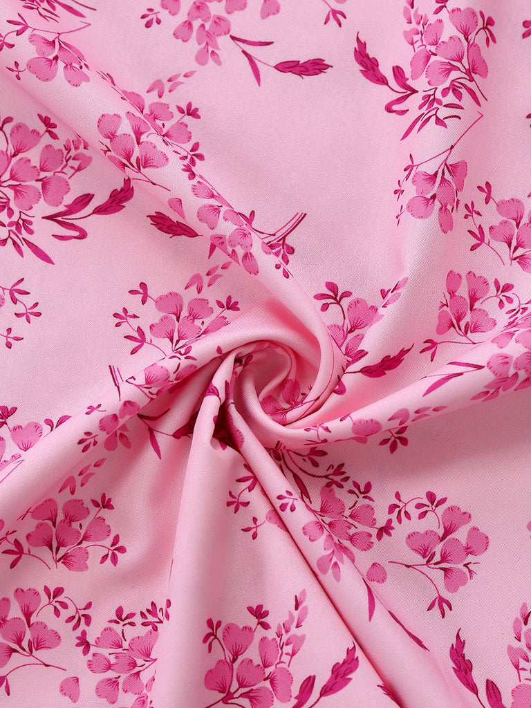 Macro view of the smooth fabric texture featuring a detailed pink floral design.