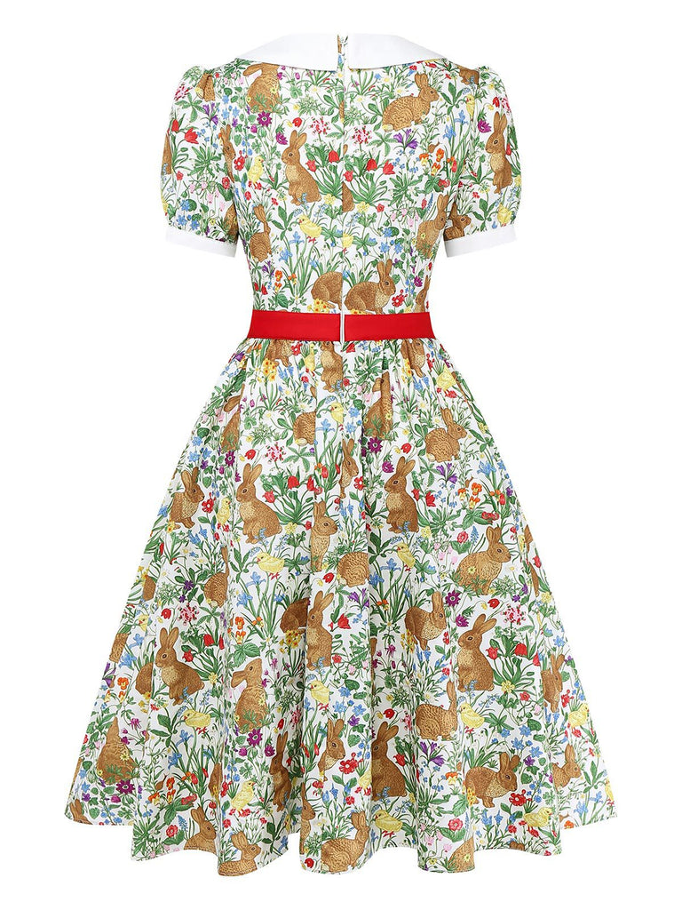 Rear view of the vintage-style dress showing the continuous bunny pattern and high-back neckline.
