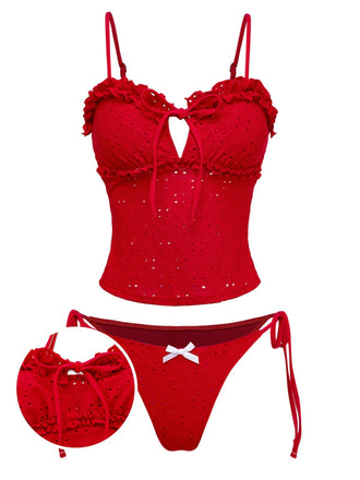 Vintage-style red embroidered tankini swimsuit with delicate cutout details, romantic ruffled trim and adjustable side-tie bottoms, perfect for 1960s-inspired beach looks