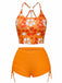 Front view of the orange floral bikini set, highlighting the scoop neck top and high-waisted swim shorts.