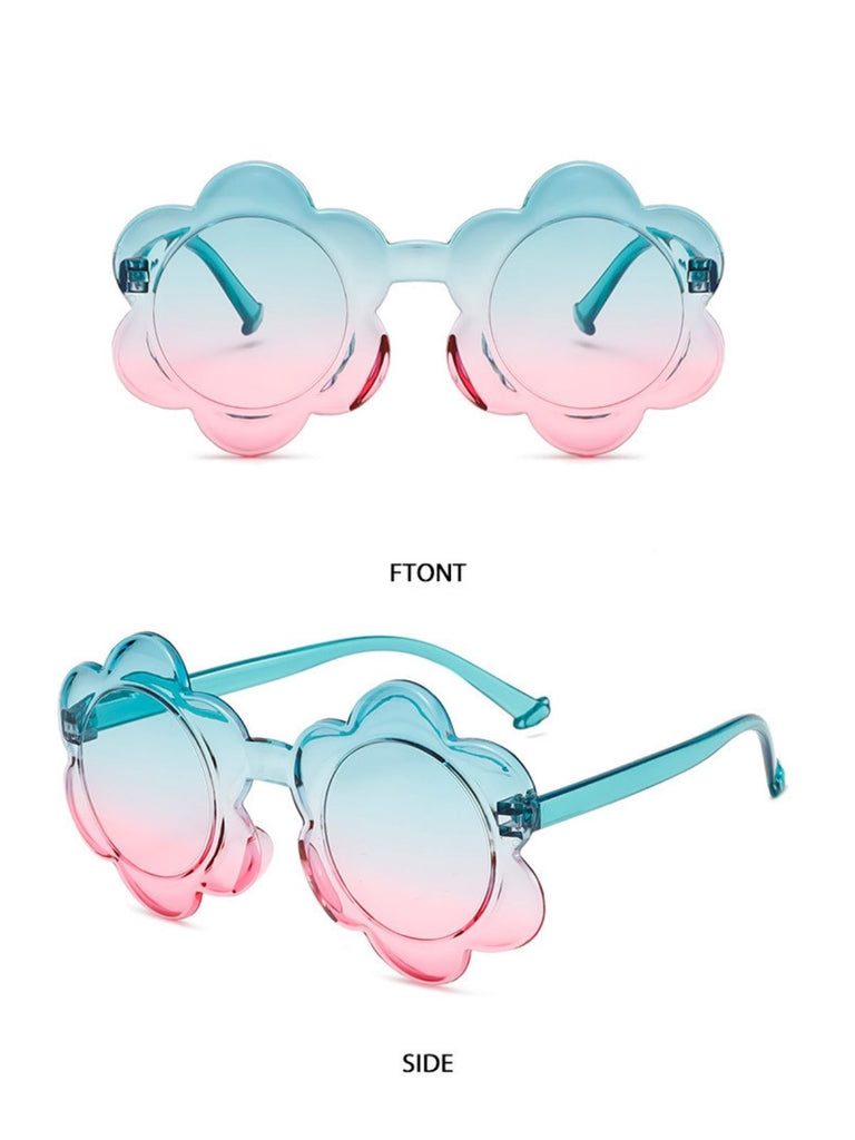 turquoise to pink gradient lenses in flower-shaped frames with a transparent teal finish.