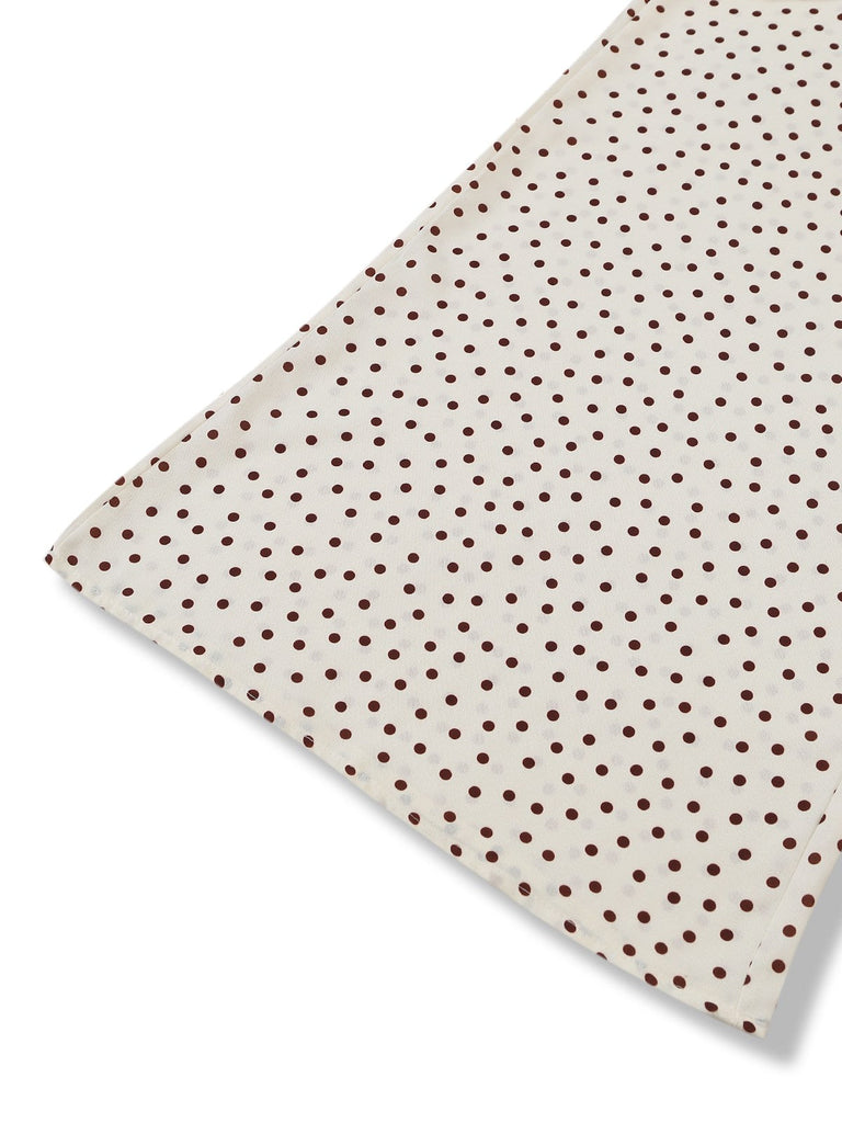 Fabric with polka dots on a white background