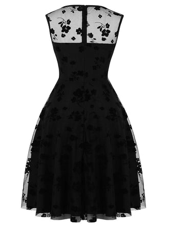 Abito nero a fiori in pizzo anni '50