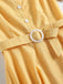 Vestito giallo con cintura scozzese anni '50