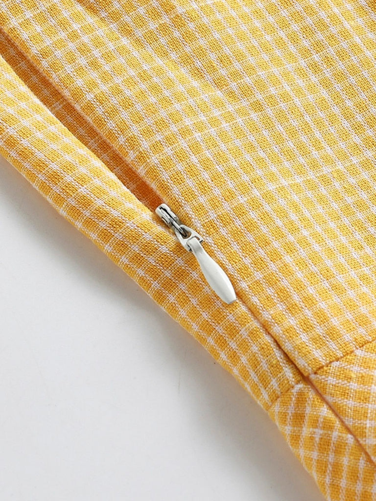 Vestito giallo con cintura scozzese anni '50