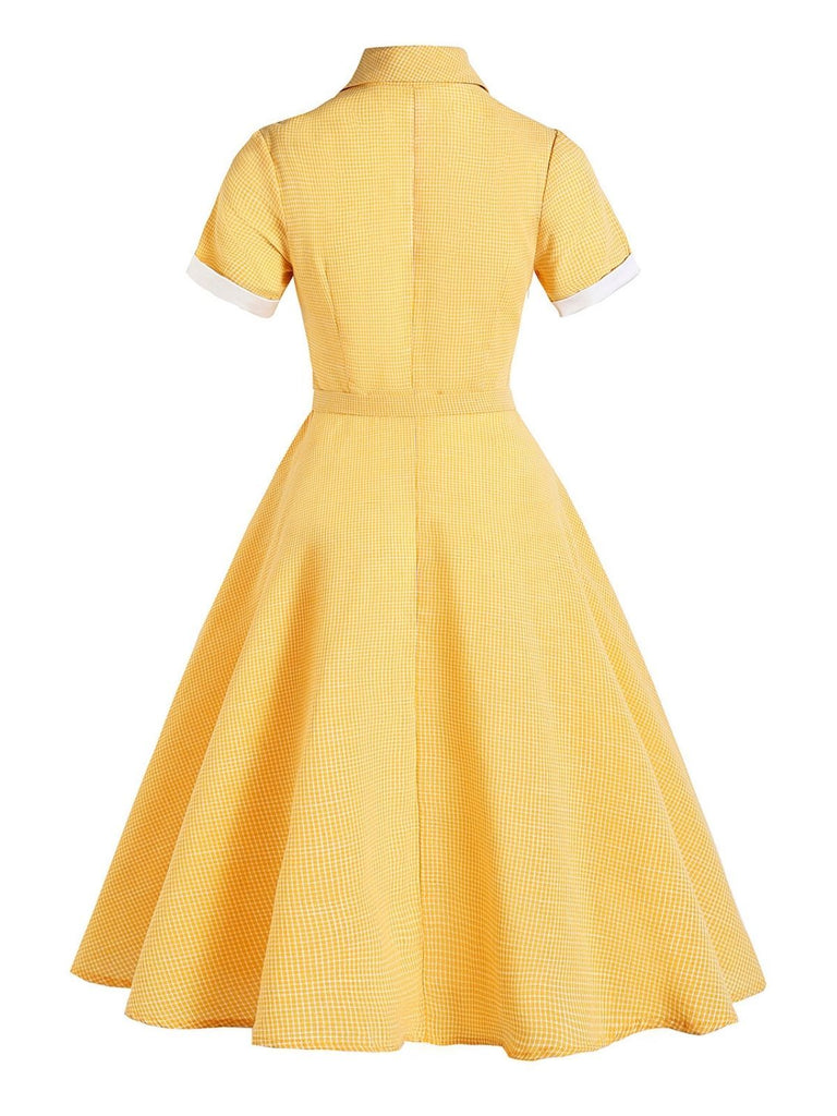 Vestito giallo con cintura scozzese anni '50