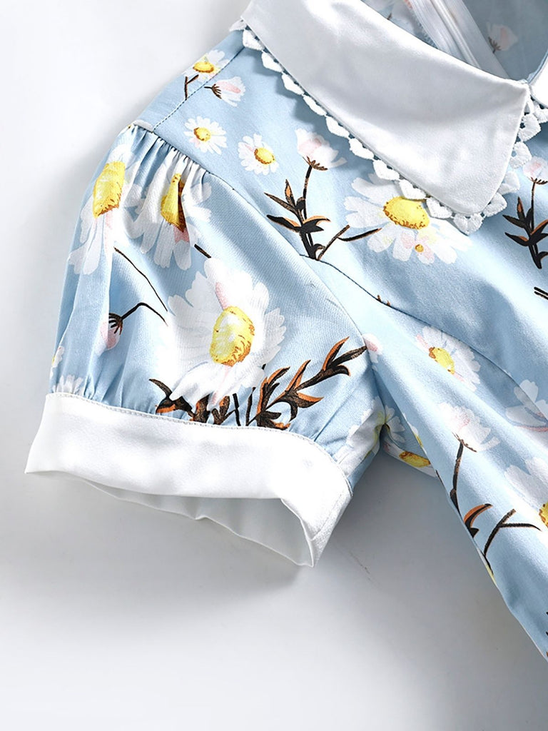 Abito svasato in pizzo floreale blu anni '50