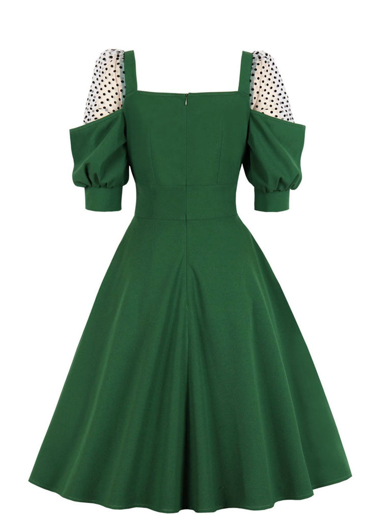 Abito tinta unita verde a pois anni '50