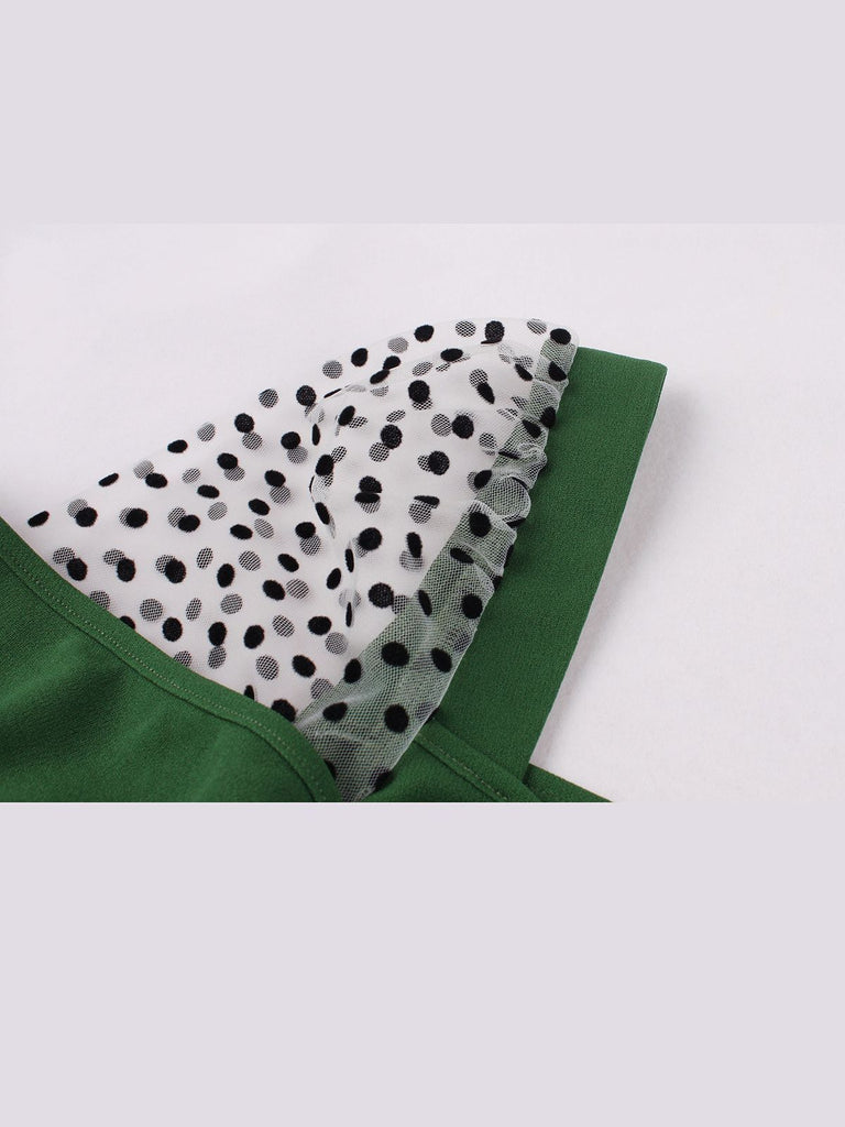 Abito tinta unita verde a pois anni '50