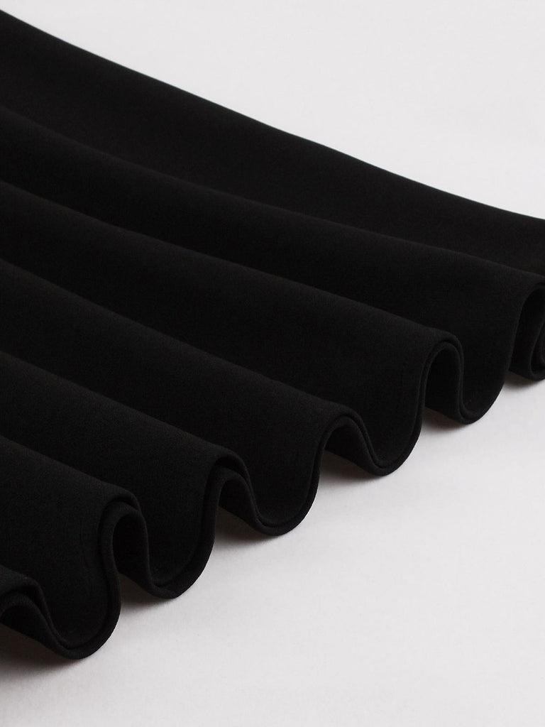 Abito solido patchwork in pizzo nero anni '50