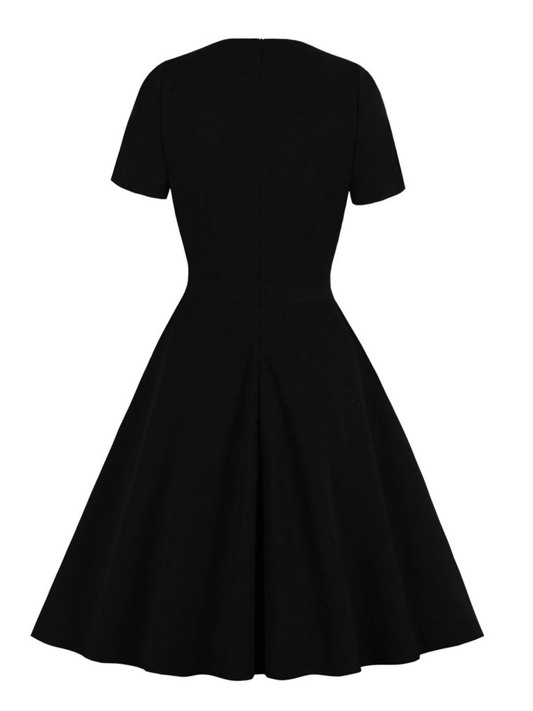 Abito solido patchwork in pizzo nero anni '50