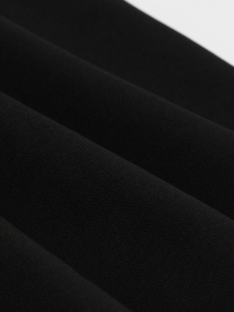 Abito solido patchwork in pizzo nero anni '50
