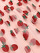 Abito Swing Fragola in pizzo rosa anni '50