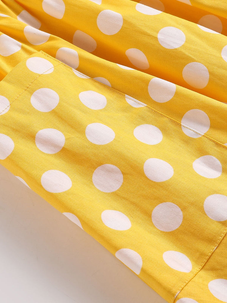 Vestito Swing con tasche a pois giallo anni '50