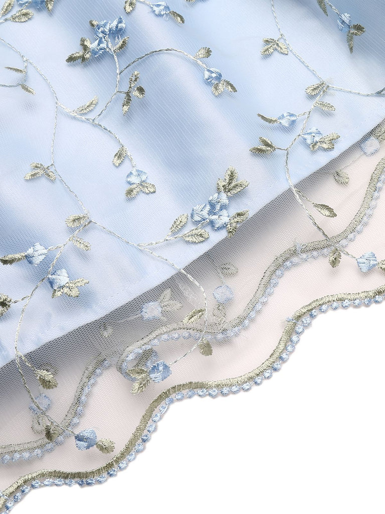 Abito blu in pizzo con ricamo floreale anni '50