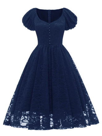 Abito in pizzo con perline e maniche a sbuffo anni '50