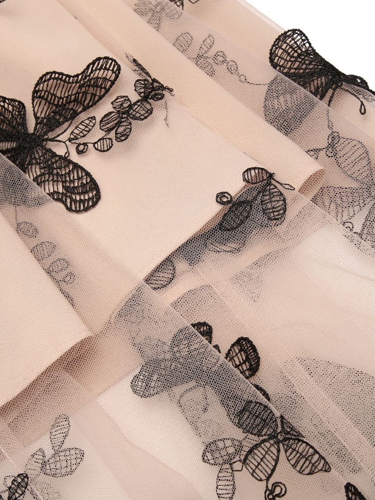 Abito a farfalla in pizzo con spalle scoperte anni '50